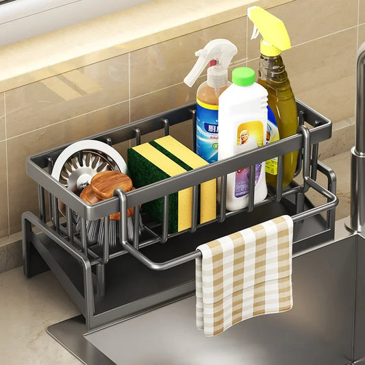 Kitchen sink drain rack organizer. Made of durable ABS plastic. Holds soap, sponge, and cloth. Includes filter basket for drainage. Perfect home kitchen accessory.